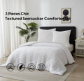 Parure de lit texturée
Seersucker blanc housse de couette, taie d’oreiller