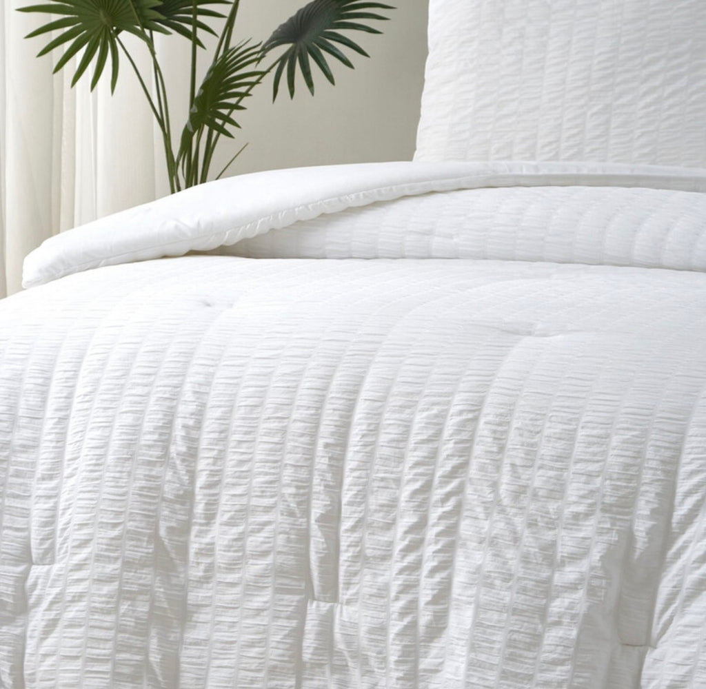 Parure de lit texturée
Seersucker blanc housse de couette, taie d’oreiller